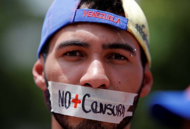 A demonstrator displays writing on this face that reads, "No more censorship", as he attends a rally against Venezuela's President Nicolas Maduro's government in Caracas, Venezuela June 27, 2017. REUTERS/Ivan Alvarado