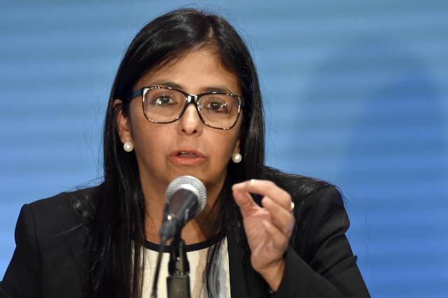 Venezuelan Foreign Minister Delcy Rodriguez speaks during a press conference after leaving a meeting with foreign ministers ahead of the OAS 47th General Assembly in Cancun, Mexico, on June 19, 2017. / AFP PHOTO / Pedro Pardo