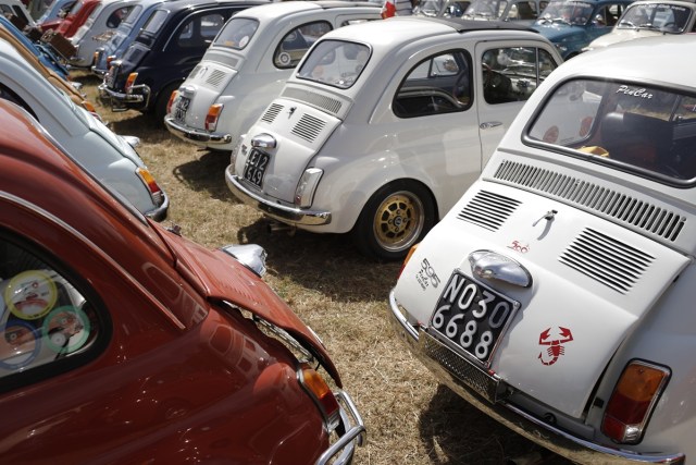 The cars of participants are parked during the 34th International Rally of Fiat 500 Club Italia for the 60th anniversary of this car on July 8, 2017, in Garlenda, near Genoa.   More than 1200 cars came from Europe to take part at the 34 rally of Garlenda to celebrate the 60th anniversary of the Fiat 500.  / AFP PHOTO / Marco BERTORELLO