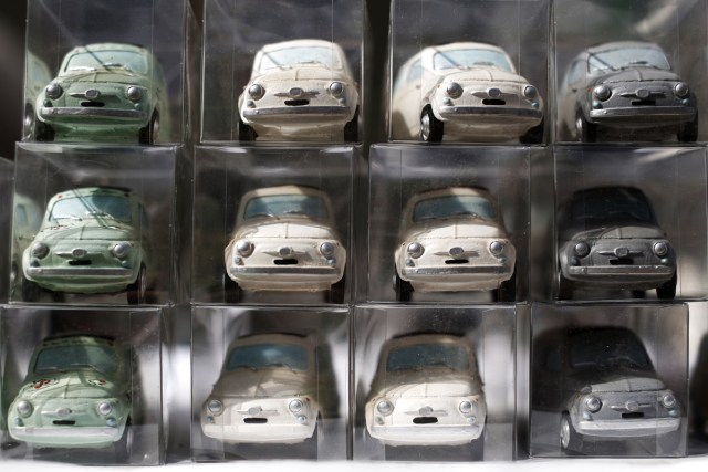 Model cars are displayed during the 34th International Rally of Fiat 500 Club Italia for the 60th anniversary of this car on July 8, 2017, in Garlenda, near Genoa.   More than 1200 cars came from Europe to take part at the 34 rally of Garlenda to celebrate the 60th anniversary of the Fiat 500.  / AFP PHOTO / Marco BERTORELLO