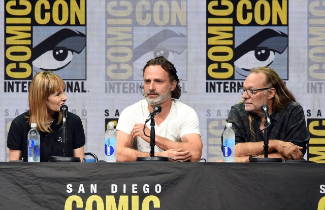SAN DIEGO, CA - JULY 21: (L-R) Producer Gale Anne Hurd, actor Andrew Lincoln, and producer Greg Nicotero speak onstage at Comic-Con International 2017 AMC's "The Walking Dead" panel at San Diego Convention Center on July 21, 2017 in San Diego, California.   Kevin Winter/Getty Images/AFP