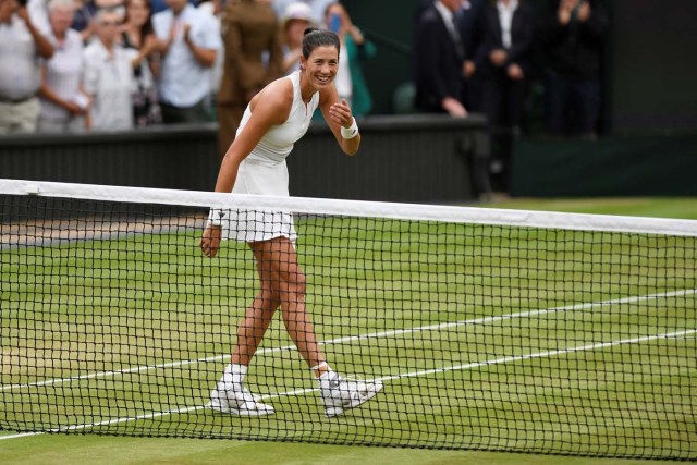 Tennis - Wimbledon - London, Britain - July 15, 2017 Spain’s Garbine Muguruza celebrates winning the final against Venus Williams of the U.S. REUTERS/Tony O'Brien