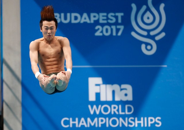 Diving – 17th FINA World Aquatics Championships – Men's 10m Platform Final – Budapest, Hungary – July 22, 2017 – Haram Woo of South Korea competes. REUTERS/David Balogh