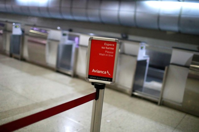 Empty counters of Avianca airline are seen at the Simon Bolivar airport in Caracas, Venezuela July 27, 2017. REUTERS/Marco Bello