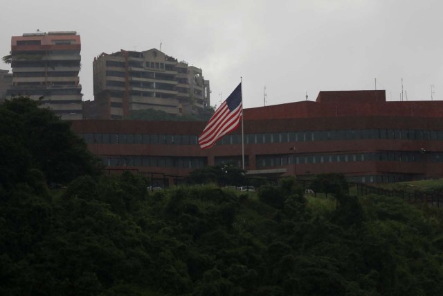 The U.S. flag flies in front of the U.S. embassy in Caracas, Venezuela July 28, 2017. REUTERS/Marco Bello
