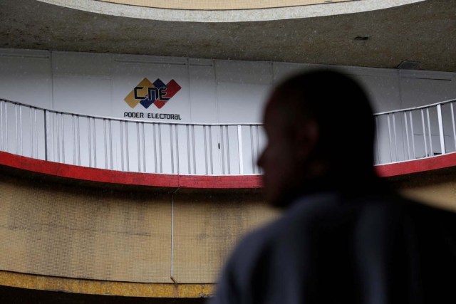 A man walks in a building of the National Electoral Council (CNE) in Caracas, Venezuela July 28, 2017. REUTERS/Marco Bello