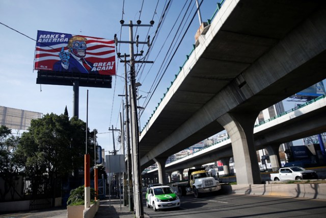 A giant billboard shows a drawing depicting U.S. President Donald Trump, along Periferico avenue in Mexico City, Mexico, July 28, 2017. REUTERS/Henry Romero