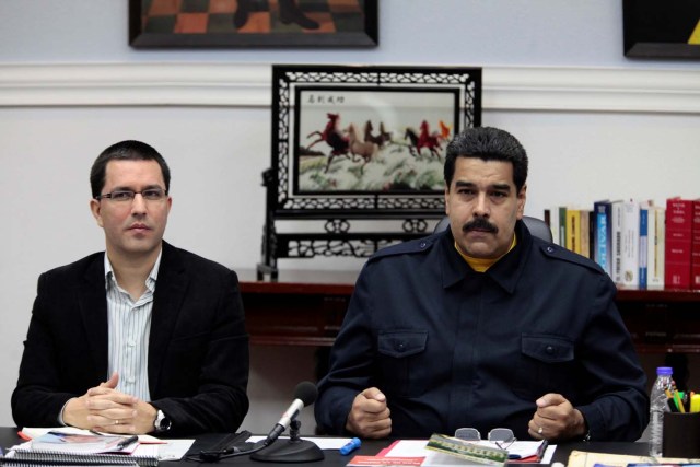 FILE PHOTO: Venezuela's President Nicolas Maduro (R) talks next to Venezuela's Vice President Jorge Arreaza during a Council of Ministers meeting at Miraflores Palace in Caracas June 18, 2014. Miraflores Palace/Handout via REUTERS/File Photo ATTENTION EDITORS - THIS PICTURE WAS PROVIDED BY A THIRD PARTY