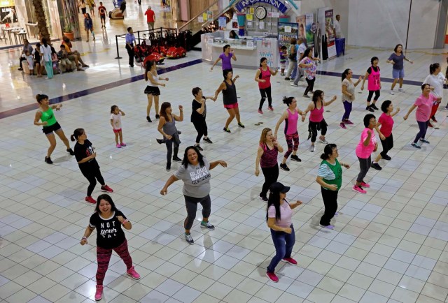 Residents do their daily routine Zumba class inside a mall on the island of Guam, a U.S. Pacific Territory August 10, 2017. REUTERS/Erik De Castro