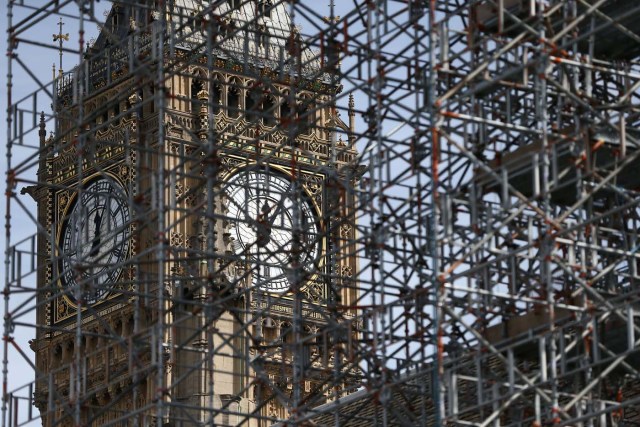 The Elizabeth Tower, which houses the Great Clock and the 'Big Ben' bell, is seen through scaffolding, above the Houses of Parliament, in central London, Britain August 14, 2017. REUTERS/Neil Hall