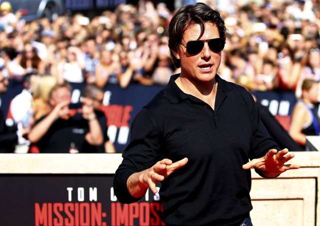 FILE PHOTO: U.S. actor Tom Cruise arrives for the world premiere of "Mission Impossible - Rogue Nation" in front of the State Opera House in Vienna, Austria, July 23, 2015. REUTERS/Leonhard Foeger/File Photo