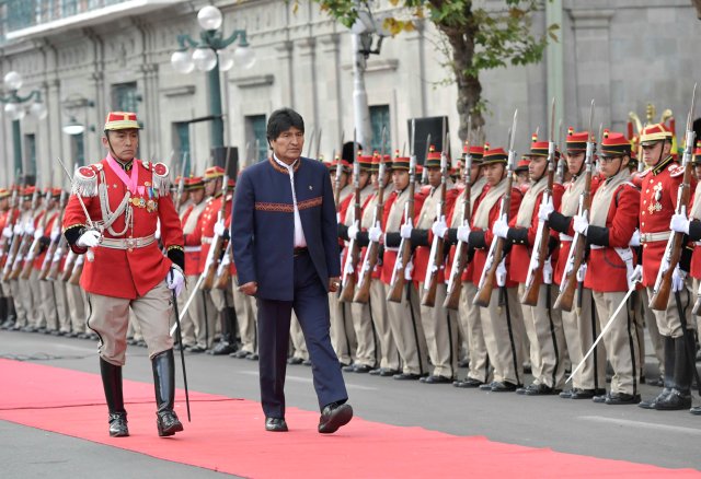 Bolivia's President Evo Morales reviews the honor guard before participating in the national flag commemoration in La Paz, Bolivia, August 17, 2017. Freddy Zarco/Courtesy of Bolivian Presidency/Handout via REUTERS ATTENTION EDITORS - THIS IMAGE WAS PROVIDED BY A THIRD PARTY.