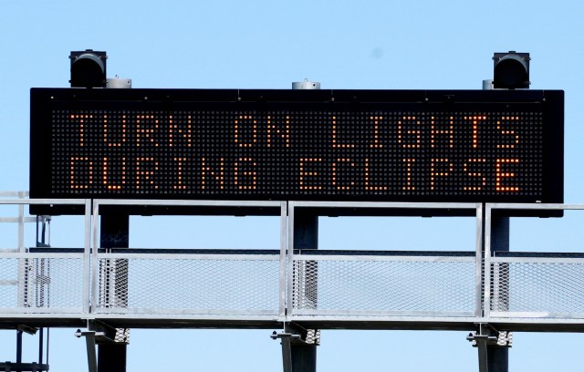 A sign on the highway refers to the upcoming solar eclipse near Guernsey, Wyoming U.S. August 19, 2017.  REUTERS/Rick Wilking