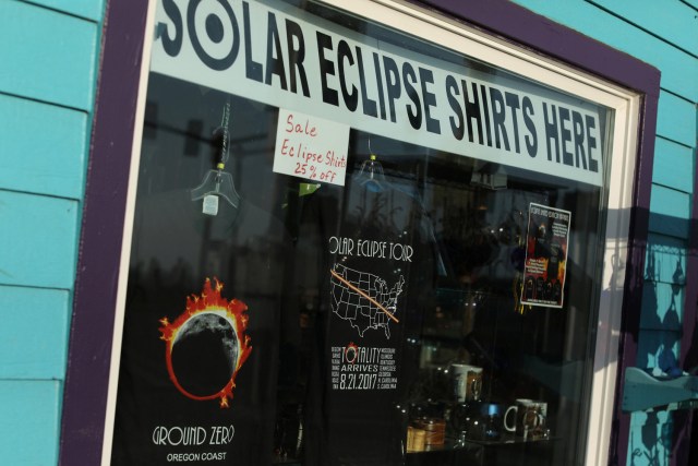 Eclipse T-shirts are shown for sale in store windows as the small town of Depoe Bay, Oregon, U.S., prepares for the coming solar eclipse,  August 19, 2017.        REUTERS/Mike Blake NO RESALES. NO ARCHIVE.