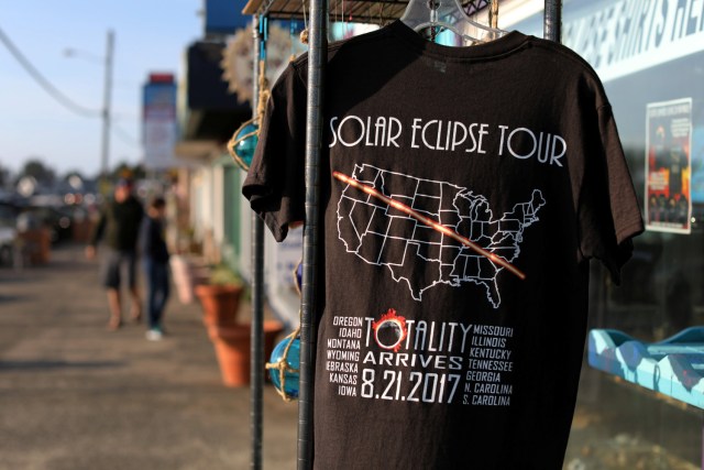 Eclipse T-shirts are shown for sale on the street as the small town of Depoe Bay, Oregon, U.S., prepares for the coming solar eclipse,  August 19, 2017.        REUTERS/Mike Blake NO RESALES. NO ARCHIVE.