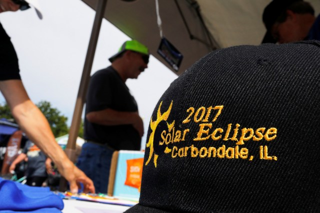 The Rotary Club sells commemorative baseball caps in Carbondale, Illinois, U.S., August 20, 2017, one day before the total solar eclipse. REUTERS/Brian Snyder NO RESALES. NO ARCHIVES.