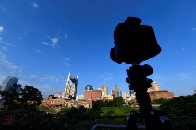 A camera is mounted on a tripod in preparation for the solar eclipse in Nashville, Tennessee, U.S. August 21, 2017. Location coordinates for this image are 39°9'55"N 86°46'24". REUTERS/Harrison McClary