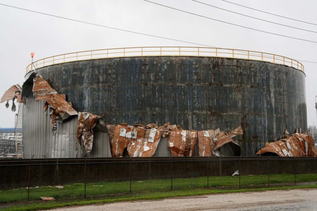 An oil tank damaged by Hurricane Harvey is seen near Seadrift, Texas, August 26, 2017. REUTERS/Rick Wilking