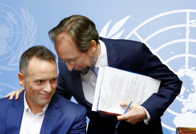 Zeid Ra'ad Al Hussein U.N. High Commissioner for Human Rights (R) speaks with Hernan Vales, UN Human Rights Officer and member of the Commission of Inquiry before a news conference on Venezuela at the United Nations in Geneva, Switzerland August 30, 2017. REUTERS/Denis Balibouse