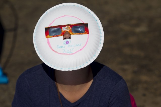 MENAN, ID - AUGUST 21: Locals and travelers from around the world gather on Menan Butte to watch the eclipse on August 21, 2017 in Menan, Idaho. Millions of people have flocked to areas of the U.S. that are in the "path of totality" in order to experience a total solar eclipse. Natalie Behring/Getty Images/AFP