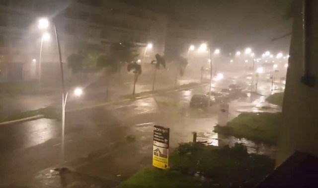 This handout picture obtained from a video released on September 19, 2017, on the Twitter account of Yves Thole shows powerful winds and rain of hurricane Maria battering a street of Pointe-a-Pitre on the French overseas Caribbean island of Guadeloupe. Hurricane Maria strengthened into a "potentially catastrophic" Category Five storm as it barrelled into eastern Caribbean islands still reeling from Irma, forcing residents to evacuate in powerful winds and lashing rain. / AFP PHOTO / TWITTER / Yves THOLE / RESTRICTED TO EDITORIAL USE - MANDATORY CREDIT "AFP PHOTO / TWITTER / YVES THOLE" - NO MARKETING NO ADVERTISING CAMPAIGNS - DISTRIBUTED AS A SERVICE TO CLIENTS