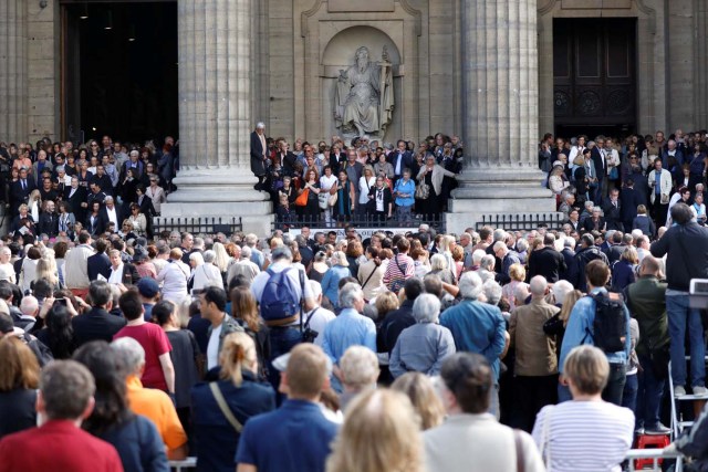 People attend the funeral ceremony of late actress Mireille Darc at the Saint-Sulpice church in Paris, France, September 1, 2017. REUTERS/Charles Platiau