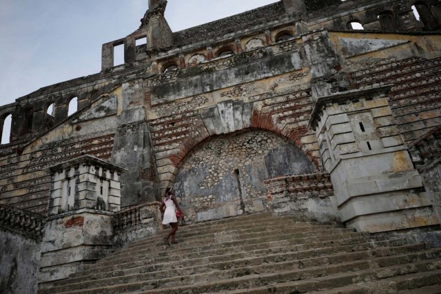 A woman climbs the stairs on the remains of Sans-Souci Palace in Milot, Haiti, September 8, 2017. REUTERS/Andres Martinez Casares