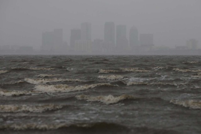 The Tampa skyline is pictured across Hillsborough Bay ahead of the arrival of Hurricane Irma in Tampa, Florida, U.S., September 10, 2017. REUTERS/Chris Wattie
