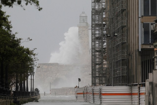 Waves crash against the lighthouse after the passing of Hurricane Irma, in Havana, Cuba, September 10, 2017. REUTERS/Stringer NO SALES. NO ARCHIVES