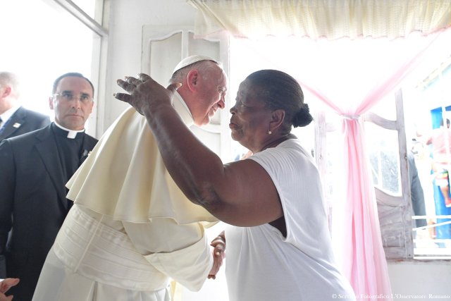 Pope Francis greets Lorenza Perez at her home in Cartagena, Colombia, 10 September 2017. Osservatore Romano/Handout via REUTERS ATTENTION EDITORS - THIS IMAGE WAS PROVIDED BY A THIRD PARTY. NO RESALES. NO ARCHIVE