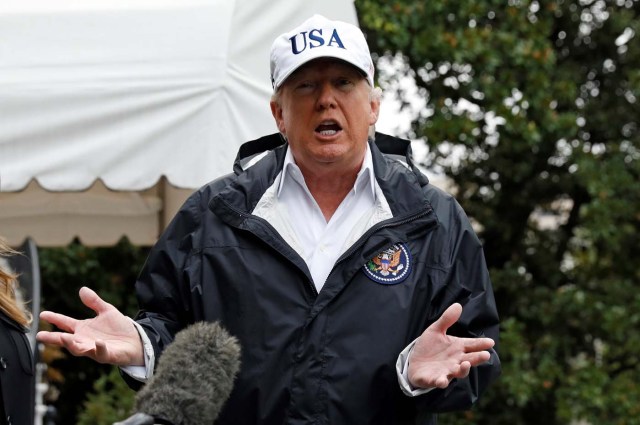 U.S. President Donald Trump speaks to reporters as he departs the White House in Washington on his way to view storm damage in Florida, U.S., September 14, 2017. REUTERS/Kevin Lamarque
