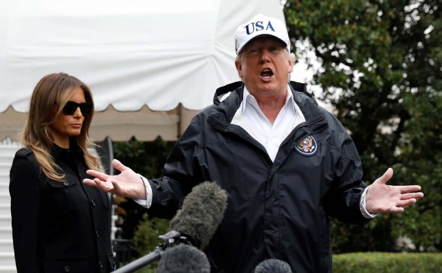 U.S. President Donald Trump speaks to reporters as he and First Lady Melania Trump depart the White House in Washington on their way to view storm damage in Florida, U.S., September 14, 2017. REUTERS/Kevin Lamarque