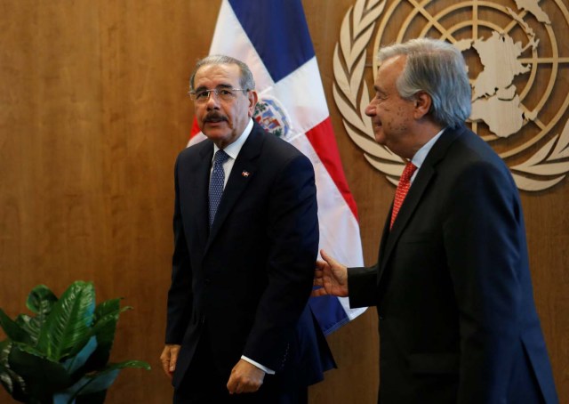 Dominican Republic President Danilo Medina (L) is greeted by United Nations Secretary General Antonio Guterres at the U.N. Headquarters in New York City, U.S., September 17, 2017. REUTERS/Joe Penney