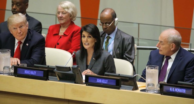 U.S. President Donald Trump (L) and White House Chief of Staff John Kelly watch as U.S. Ambassador the U.N. Nikki Haley speaks during a panel convened to discuss reforming the United Nations before the 72nd United Nations General Assembly at U.N. headquarters in New York, U.S., September 18, 2017. REUTERS/Lucas Jackson
