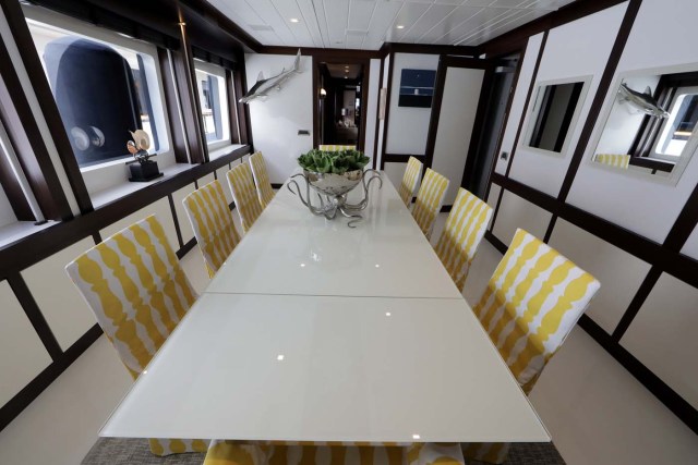 The dining room aboard the Scout super yacht is seen during the Monaco Yacht show, one of the most prestigious pleasure boat show in the world, highlighting hundreds of yachts for the luxury yachting industry and welcomes 580 leading companies, in the port of Monaco, September 27, 2017. REUTERS/Eric Gaillard