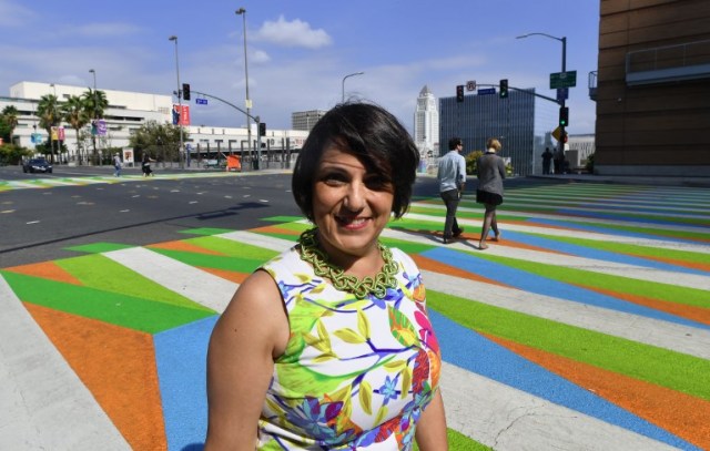 Adriana Cruz-Diez, daughter of Venezuelan-born artist Carlos Cruz-Diez who's painted crosswalks outside the Broad Museum in Los Angeles, California are a part of the Pacific Standard Time LA/LA Show, an exploration of Latino and Latin American Art in dialogue with Los Angeles on September 14, 2017 in Los Angeles, California. / AFP PHOTO / FREDERIC J. BROWN