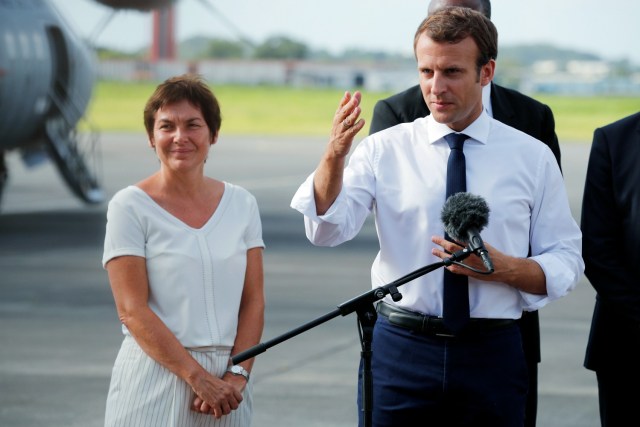 France's President Emmanuel Macron (R), next to French Overseas Minister Annick Girardin (L), addresses the media upon his arrival in Pointe-a-Pitre, Guadeloupe island, the first step of his visit to French Caribbean islands on September 12, 2017.  Christophe Ena / AFP