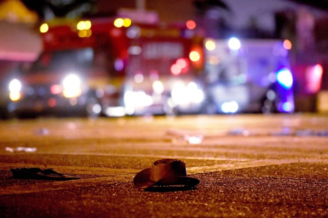 LAS VEGAS, NV - OCTOBER 02: A cowboy hat lays in the street after shots were fired near a country music festival on October 1, 2017 in Las Vegas, Nevada. A gunman has opened fire on a music festival in Las Vegas, leaving at least 20 people dead and more than 100 injured. Police have confirmed that one suspect has been shot. The investigation is ongoing. David Becker/Getty Images/AFP