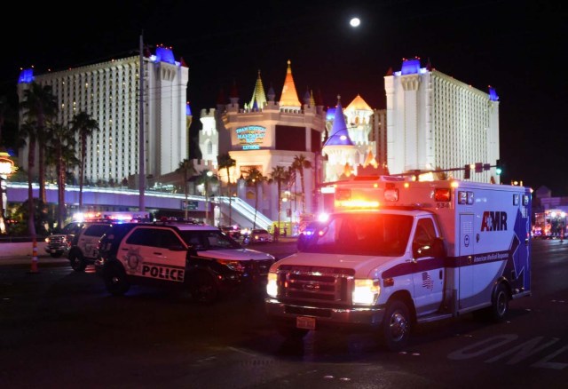 LAS VEGAS, NV - OCTOBER 02: An ambulance leaves the intersection of Las Vegas Boulevard and Tropicana Ave. after a mass shooting at a country music festival nearby on October 2, 2017 in Las Vegas, Nevada. A gunman has opened fire on a music festival in Las Vegas, leaving at least 20 people dead and more than 100 injured. Police have confirmed that one suspect has been shot. The investigation is ongoing. Ethan Miller/Getty Images/AFP