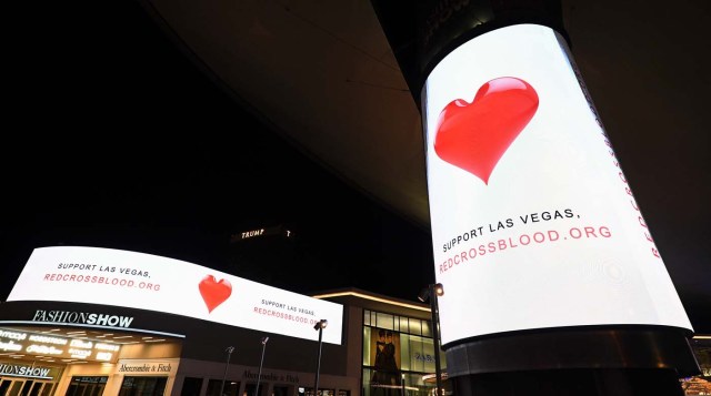 LAS VEGAS, NV - OCTOBER 03: Electronic signs outside the Fashion Show mall on the Las Vegas Strip direct people to support Las Vegas by giving blood to the Red Cross in response to Sunday night's mass shooting at a music festival on October 3, 2017 in Las Vegas, Nevada. Late Sunday night, a lone gunman killed at least 59 people and injured more than 500 after he opened fire on a large crowd at the Route 91 Harvest country music festival. The massacre is one of the deadliest mass shooting events in U.S. history.   Ethan Miller/Getty Images/AFP