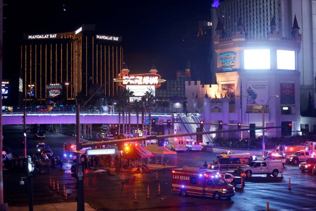 Las Vegas Metro Police and medical workers stage in the intersection of Tropicana Avenue and Las Vegas Boulevard South after a mass shooting at a music festival on the Las Vegas Strip in Las Vegas, Nevada, U.S. October 1, 2017. REUTERS/Las Vegas Sun/Steve Marcus