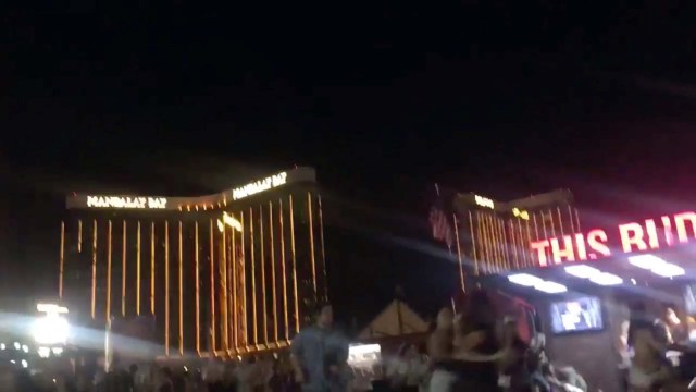 People run outside the Mandalay Bay Hotel after a gunman opened fire on attendees of the Route 91 Harvest Music Festival in Las Vegas, U.S., October 1, 2017 in this still image obtained from social media video. TWITTER/ @MORGANDBAMBI via REUTERS THIS IMAGE HAS BEEN SUPPLIED BY A THIRD PARTY. MANDATORY CREDIT.NO RESALES. NO ARCHIVES