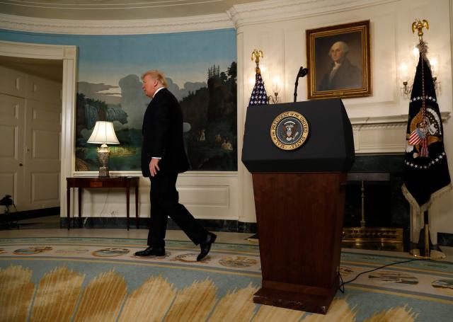 U.S. President Donald Trump departs after making a statement on the mass shooting in Las Vegas from the Diplomatic Room at the White House in Washington, U.S., October 2, 2017. REUTERS/Kevin Lamarque