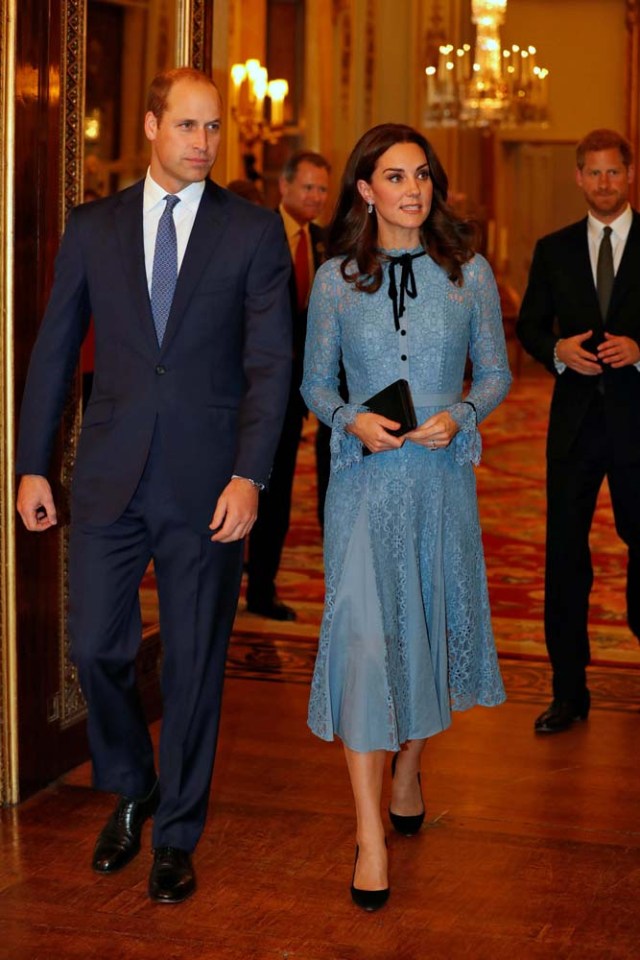 Britain's Prince William, Duke of Cambridge, Catherine Duchess of Cambridge and Prince Harry celebrate World Mental Health Day at Buckingham Palace in London, Britain, October 10, 2017. REUTERS/ Heathcliff O'Malley/Pool