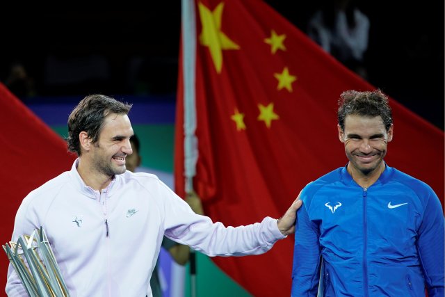Los tenistas Roger Federer y Rafael Nadal. REUTERS/Aly Song