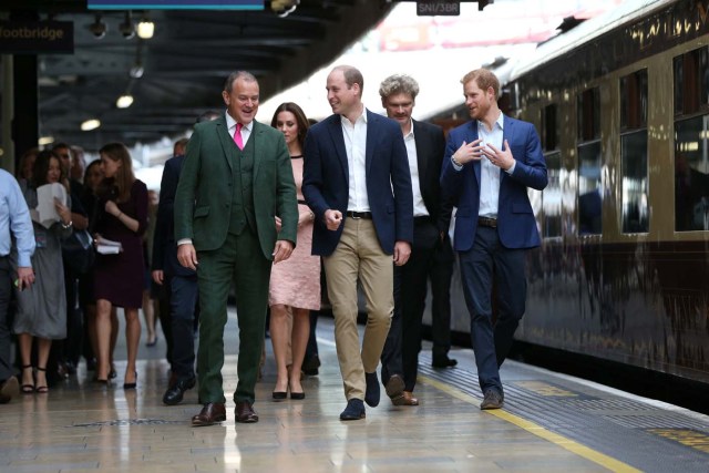 Actor Hugh Bonneville and Simon Farnaby walk with Britain's Prince William, Catherine, The Duchess of Cambridge and Prince Harry as they attend the Charities Forum at Paddington Station in London, October 16, 2017. REUTERS/Jonathan Brady/Pool