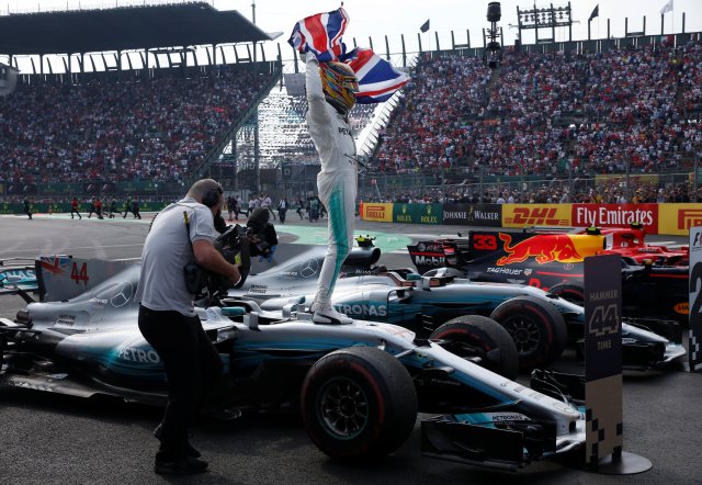 F1 - Formula 1 - Mexican Grand Prix 2017 - Mexico City, Mexico - October 29, 2017  Mercedes' Lewis Hamilton celebrates after winning the World Championship     REUTERS/Henry Romero