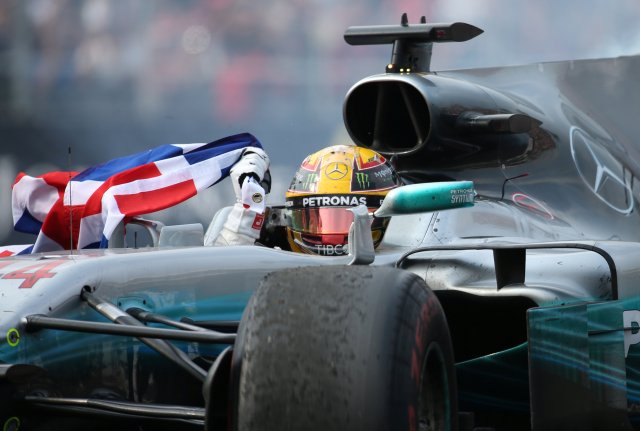 F1 - Formula 1 - Mexican Grand Prix 2017 - Mexico City, Mexico - October 29, 2017  Mercedes' Lewis Hamilton celebrates after winning the World Championship     REUTERS/Edgard Garrido