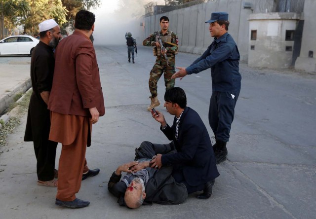 ATTENTION EDITORS - VISUAL COVERAGE OF SCENES OF INJURY OR DEATH An injuried man lies on the ground after a blast in Kabul, Afghanistan October 31, 2017.REUTERS/Mohammad Ismail TEMPLATE OUT