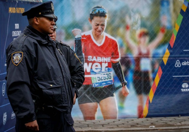 New York City Police (NYPD) officers stand by near the finish line of the New York City Marathon in Central Park in New York, U.S. November 5, 2017. REUTERS/Brendan McDermid